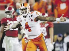  ?? STREETER LECKA / GETTY IMAGES ?? Clemson quarterbac­k Deshaun Watson ended Alabama’s 26-game winning streak on Monday night in Tampa.