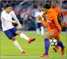  ??  ?? England’s Jesse Lingard shoots at goal. — Reuters photo