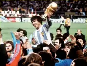 ??  ?? Argentina captain Daniel Passarella with the trophy.