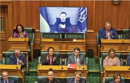  ?? Photo: ?? Ukrainian President Volodymyr Zelenskyy appears via video during his address to the New Zealand Parliament in Wellington on December 14, 2022. AP