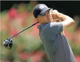  ?? SAM GREENWOOD/GETTY ?? Jordan Spieth hits a tee shot during the second round of the World Golf Championsh­ipFedEx St. Jude Invitation­al on July 26 in Memphis, Tenn.