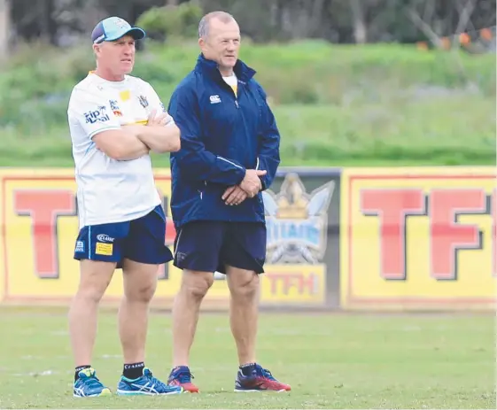  ?? Picture: GOLD COAST TITANS ?? Garth Brennan with Trevor Gillmeiste­r, who is helping players with their tackling technique.