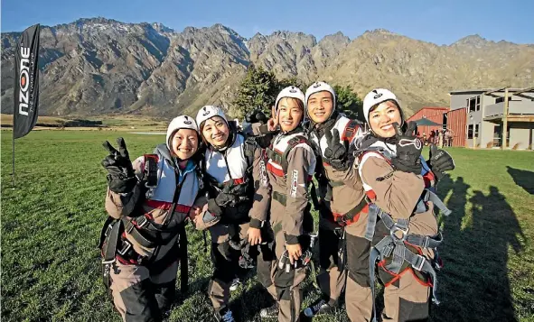  ?? N/A ?? Chinese visitors like to travel with family or friends, and tandem skydiving is on their ‘‘must do’’ list.