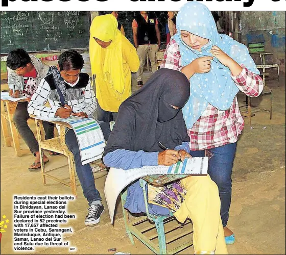  ?? AFP ?? Residents cast their ballots during special elections in Binidayan, Lanao del Sur province yesterday. Failure of election had been declared in 52 precincts with 17,657 affected voters in Cebu, Sarangani, Marinduque, Antique, Samar, Lanao del Sur and...