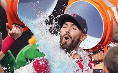  ?? ELISE AMENDOLA/AP PHOTO ?? Boston Red Sox starting pitcher Rick Porcello is doused after he threw a one-hitter against the New York Yankees in Friday night’s game at Fenway Park in Boston. The Red Sox won 4-1.