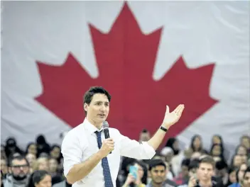  ?? NATHAN DENETTE/THE CANADIAN PRESS ?? Prime Minister Justin Trudeau answers questions from the public during his town hall meeting Wednesday in Hamilton, Ont.