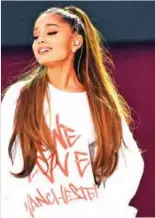  ??  ?? In this handout photo provided by Dave Hogan for One Love Manchester, singer Ariana Grande performs at the One Love Manchester tribute concert in Manchester, north western England, Sunday. — AP