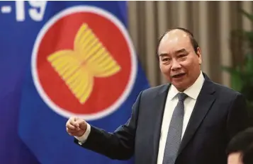  ?? — AP ?? Optimistic: Vietnamese Prime Minister Nguyen Xuan Phuc says the country will try to keep economic growth over 5% this year.