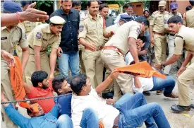  ?? —DC ?? Cops arrest ABVP students protesting in front of Stanley College in Gunfoundry demanding stoppage of Group II counsellin­g on Monday.