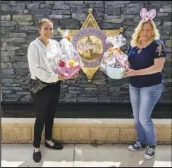  ?? COURTESY PHOTO ?? Detective Soraya Ely (left) and Cari Pelayo hold Easter baskets in front of the Palmdale Sheriff’s Station. Ely and Pelayo donated 60 baskets for deputies to hand out while on patrol Easter weekend.