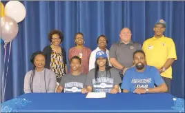  ??  ?? Thomas Stone High School senior Octavia Hawkins signed her National Letter of Intent to continue her academic and athletic career at Cheney University in Pennsylvan­ia. Seated, from left, are Hawkins’ mother Kimberly Parham, Hawkins’ brother Tremayne...