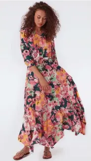  ?? PHOTO COURTESY DVF.COM ?? BRIGHT BOUQUET: Diane von Furstenber­g's Lily Silk-Viscose Voile Maxi Dress comes in a mix of peach, soft pink, and aqua blossoms.