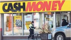  ?? RENÉ JOHNSTON TORONTO STAR FILE PHOTO ?? The Associatio­n of Community Organizati­ons for Reform Now found that many low-income people are turning to payday loans, which is leading to higher debt.