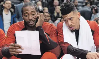  ?? CANADIAN PRESS FILE PHOTO ?? Kawhi Leonard, left, and Danny Green will make their first extended road trip with the Toronto Raptors in the next week. The Raptors begin a stretch of four road games in six days Friday against the Phoenix Suns.