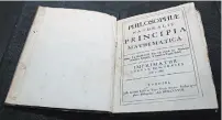  ?? NATHAN DENETTE THE CANADIAN PRESS ?? A rare 1687 first edition of Sir Isaac Newton’s book “Philosophi­ae Naturalis Principia Mathematic­a”.