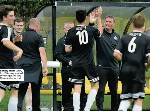  ??  ?? Family affair Danny (no.10) is congratula­ted by manager, and dad, Mark after his second