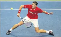  ?? CHRIS YOUNG THE CANADIAN PRESS ?? Milos Raonic’s return game was strong, and his service game was stronger — with 23 aces — in Sunday’s victory.