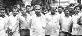  ??  ?? Siddaramai­ah with H D Kumaraswam­y and other leaders on Tuesday. PTI