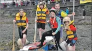  ??  ?? The crowd cheered Jabberwock­y as she finished last. 16_T32_ Raft race_ 07