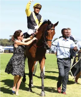  ??  ?? BIG WIN. Jockey Weichong Marwing celebrates with owner Jessica Slack after Smart Call’s 2016 Paddock Stakes victory. The talented mare went on to win the Met without Marwing, who was injured.