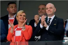  ?? AFP ?? Croatia’s President Kolinda Grabar-Kitarovic and Fifa president Gianni Infantino attend the match between Russia and Croatia. —