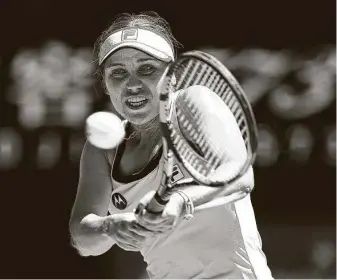  ?? Cameron Spencer / Getty Images ?? Sofia Kenin of the United States looked far from the same player who won it all in 2020 during her first match at Melbourne against Maddison Inglis but was content to still be in the running.