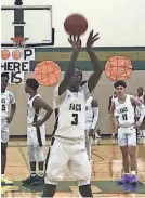  ?? KHARI THOMPSON / THE COMMERCIAL APPEAL ?? FACS' TJ Thomas takes a free-throw in the DII-A quarterfinals