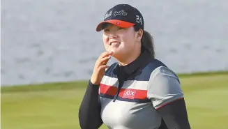  ?? AP-Yonhap ?? Angel Yin of the United States smiles after finishing the second round of the LPGA KEB HanaBank Championsh­ip at Sky72 Golf Club in Incheon, Friday.