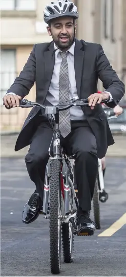  ??  ?? Peddling a new policy: Transport Minister Humza Yousaf