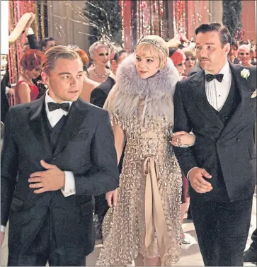  ??  ?? Leonardo DiCaprio, left, Carey Mulligan and Joel Edgerton star in 2013 movie of The Great Gatsby