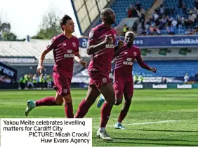  ?? ?? Yakou Meite celebrates levelling matters for Cardiff City
PICTURE: Micah Crook/ Huw Evans Agency