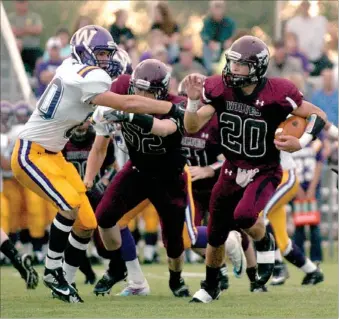  ?? MARK HUMPHREY ENTERPRISE-LEADER ?? Tyler Cummings carries the football against Westville, Okla., on Friday. Cummings had four rushes for 28 yards before leaving the game. Lincoln won, 37-0, in the season opener for both teams.