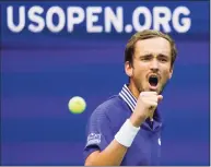  ?? Seth Wenig / Associated Press ?? Daniil Medvedev reacts after scoring a point against Felix Auger-Aliassime during the U.S. Open semifinals on Friday.