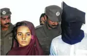  ?? Iram Asim / Associated Press ?? Aasia Bibi and her boyfriend, Shahid Lashari, were presented to journalist­s at a police station in Pakistan on Oct. 30.