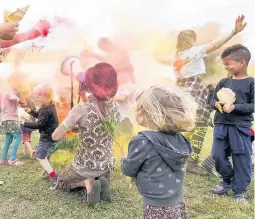  ??  ?? Pictured are festival-goers taking part in the holi powder run. Picture courtesy of Ed Chappell.