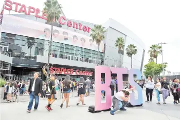  ??  ?? Fans await the BTS concert at the Staples Center as part of the “Love Yourself” North American Tour on Sept 5 in Los Angeles, California. — AFP photo
