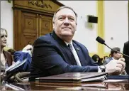  ?? T.J. KIRKPATRIC­K/THE NEW YORK TIMES ?? Secretary of State Mike Pompeo prepares to testify before the House Foreign Affairs Committee in Washington, Friday.
