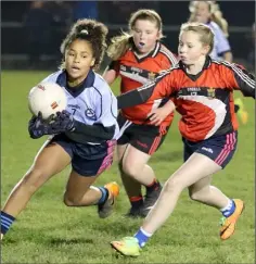  ??  ?? Mollie Thompson-Chin taking on Veda Hanlon-O’Leary and Lisa Foley.