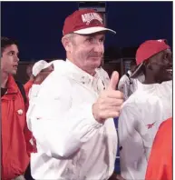  ?? (Democrat-Gazette file photo) ?? John McDonnell, Arkansas’ former men’s cross country and track and field coach who died late Monday at age 82, was a worldwide celebrity in the track and field world, according to Razorbacks women’s Coach Lance Harter.