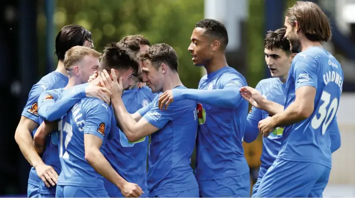  ?? Www.mphotograp­hic.co.uk ?? ●●Macauley Southam-Hales and his County team-mates celebrate the opening goal against Torquay United at the weekend