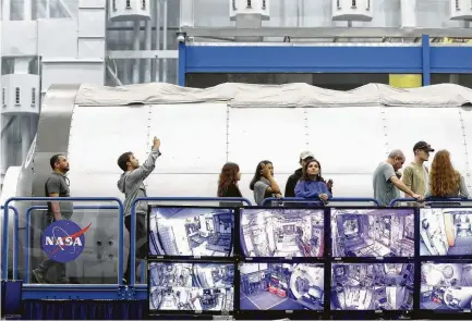  ?? Photos by Melissa Phillip / Staff photograph­er ?? Visitors tour mockup sections of the Internatio­nal Space Station at Johnson Space Center during an open house Saturday. The tour of NASA’s facilities marks the first time in five years that the Houston space center was open to the public.