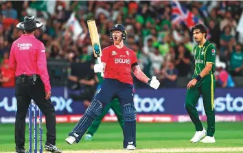  ?? AFP ?? England’s Ben Stokes celebrates their win in the Twenty20 World Cup final against Pakistan at the Melbourne Cricket Ground yesterday. The all-rounder scored an unbeaten 52.