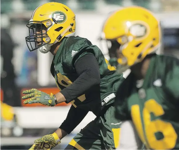  ?? IAN KUCERAK ?? Linebacker Terrance Bullitt, intent on making a name for himself, runs through a drill at the Edmonton Eskimos’ training camp. Bullitt is looking to resurrect his football career after coaching the Dallas Desire in the Lingerie Football League.