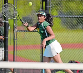  ?? SEAN D. ELLIOT/THE DAY ?? New London’s Janke Patel returns the ball during her match against NFA’s Lauren Jacobs on Monday. Patel lost the match, but the Whalers beat NFA 4-3 to qualify for the Class S state tournament.