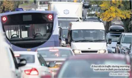  ?? Picture: Matt Cardy ?? A bus sits in traffic during morning rush hour in Bath pre-lockdown