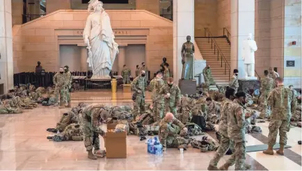  ?? JASPER COLT/USA TODAY ?? Security around the U.S. Capitol is heightened as the House of Representa­tives reconvenes to debate Trump impeachmen­t following Pro-Trump riots on the Capitol building and ahead of inaugurati­on on Jan. 13.