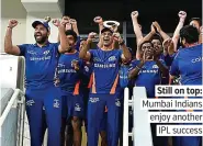  ??  ?? Still on top: Mumbai Indians enjoy another IPL success