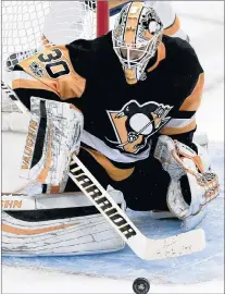  ?? AP PHOTO ?? In this Oct. 7 file photo, Pittsburgh Penguins goalie Matt Murray makes a save against the Nashville Predators during an NHL game in Pittsburgh.