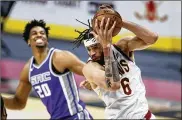  ?? AP ?? The Cavaliers on Thursday beat the NBA trading deadline by sending backup center JaVale McGee (6) to the
Denver Nuggets in exchange for young 7-footer Isaiah Hartenstei­n and two second-round draft picks.