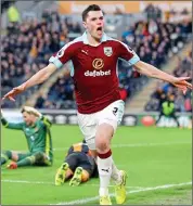  ??  ?? PAYBACK: Michael Keane, after conceding the penalty, celebrates after scoring Burnley’s equaliser